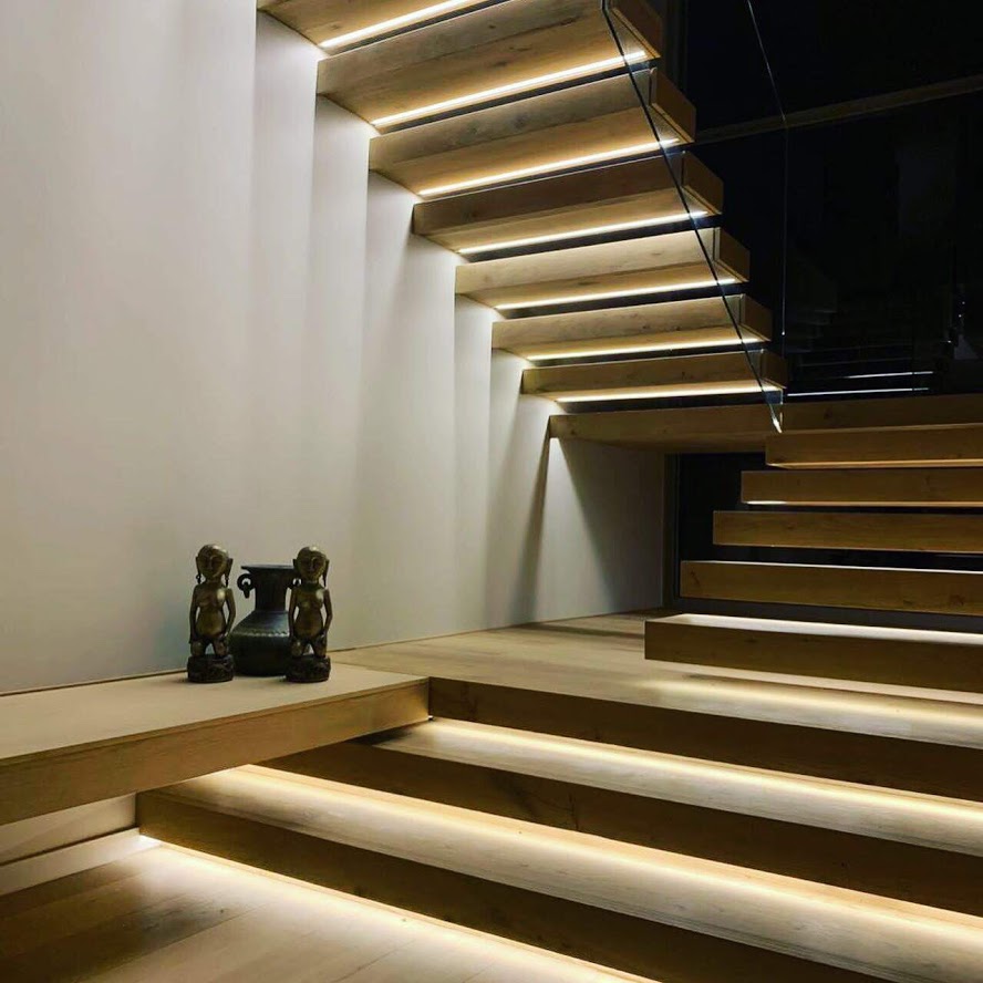 Floating Oak staircase with Panga Panga inlays